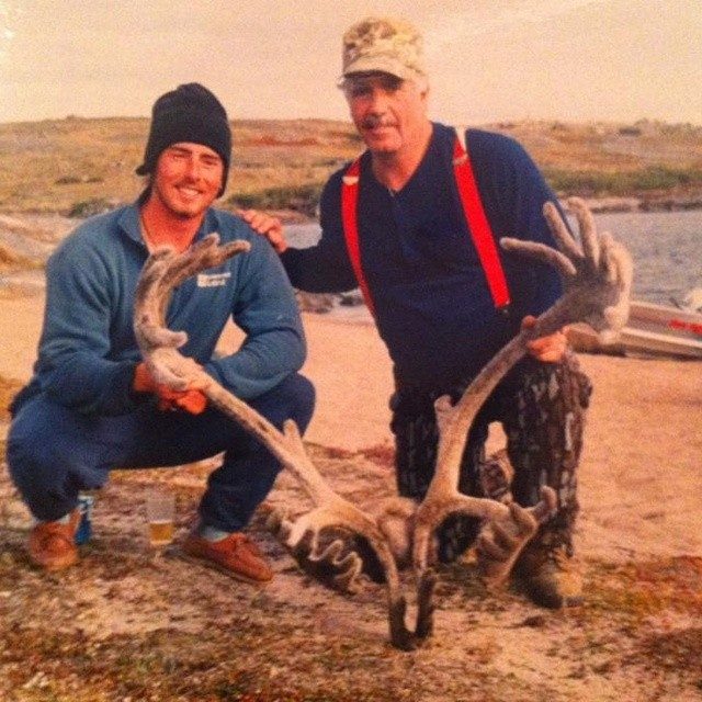 The founder and his late father together outdoors