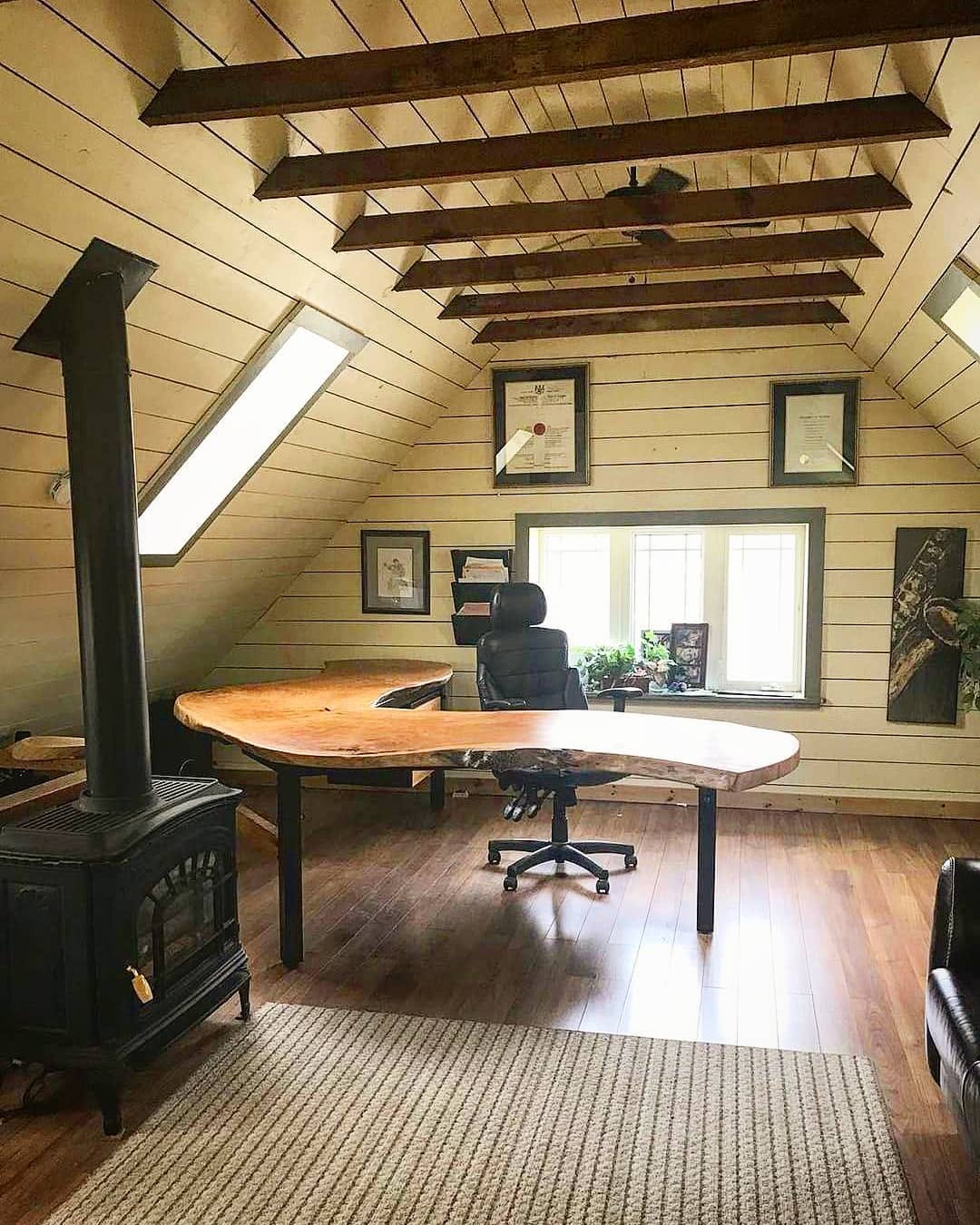 Curved live-edge slab desk in a loft office